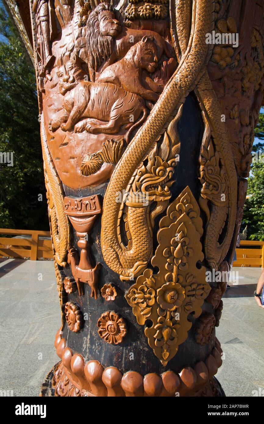 engraving wood art Wat Phra That Doi Suthep temple, Thailand Chiang Mai, buddhism buddhists people leave offers Stock Photo