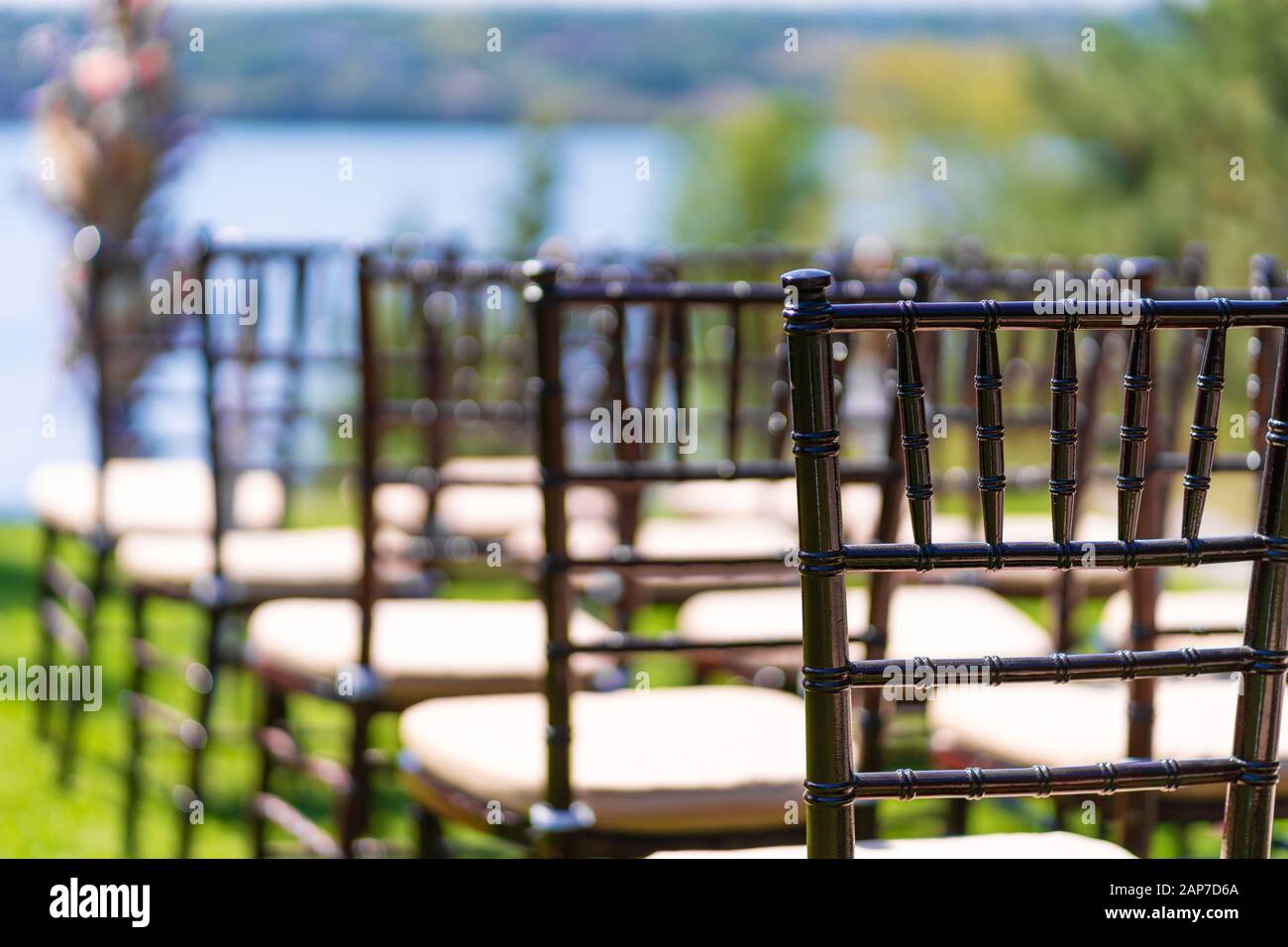 Rows of chairs for guests at an open-air wedding ceremony Stock Photo ...