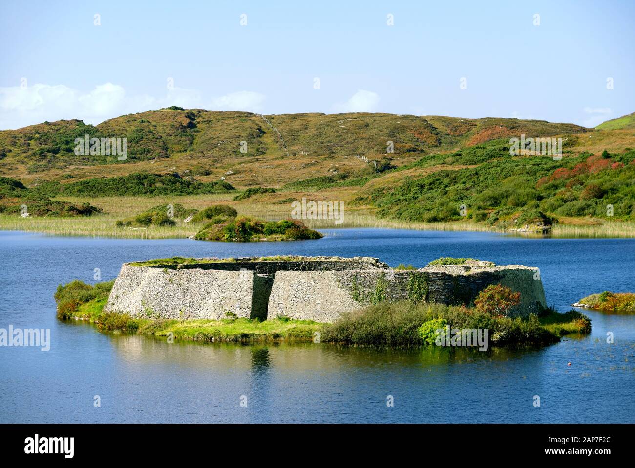 Doon Fort prehistoric stone cashel caiseal or dun. Pre Christian refuge on small crannog lake isle in Doon Lough near Ardara, Donegal, Ireland Stock Photo