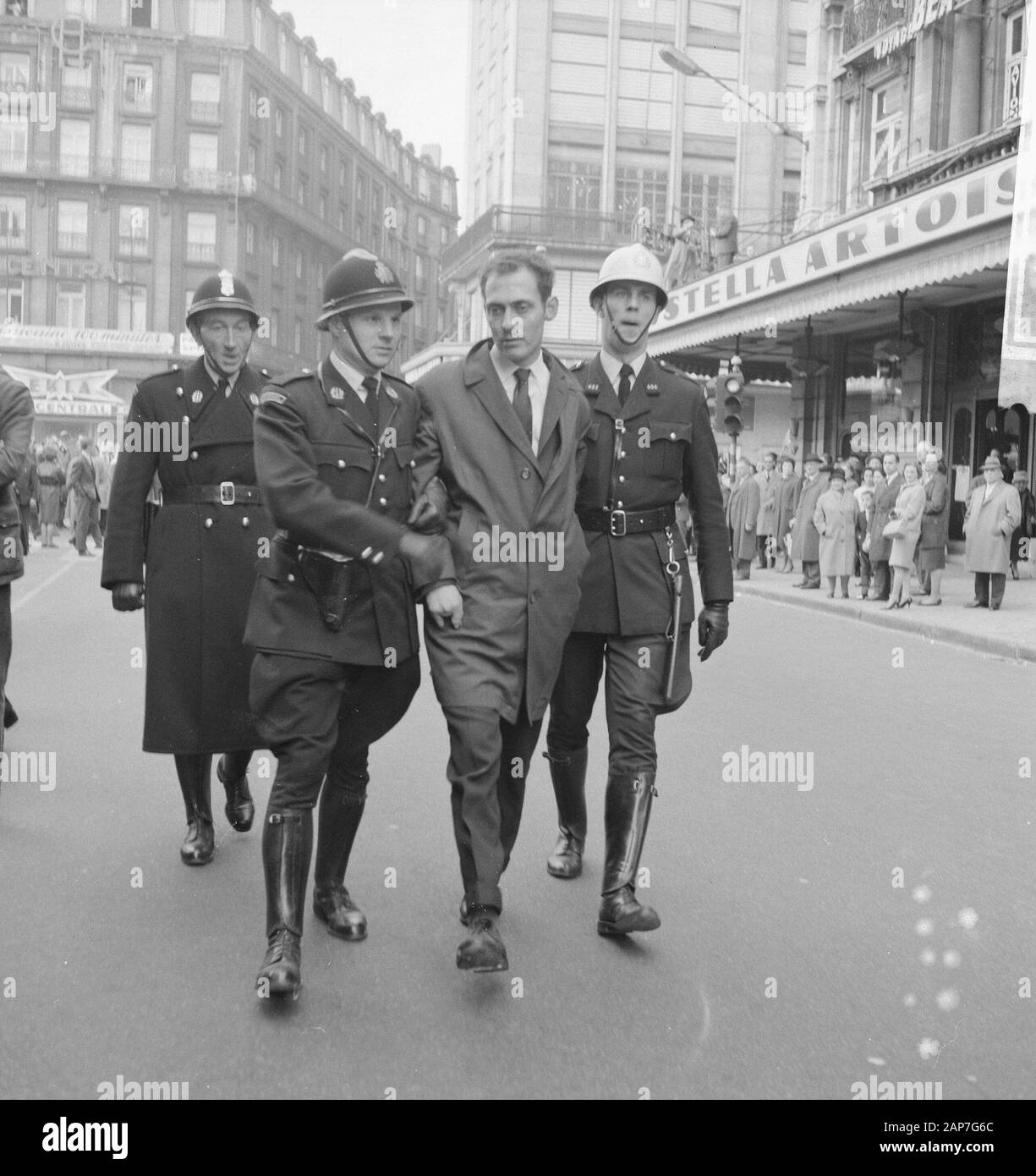 Demonstration in Brussels. Police brings arrests on Date: 22 October 1961 Location: Brussels Keywords: POLICE, arrests, demonstrations Stock Photo