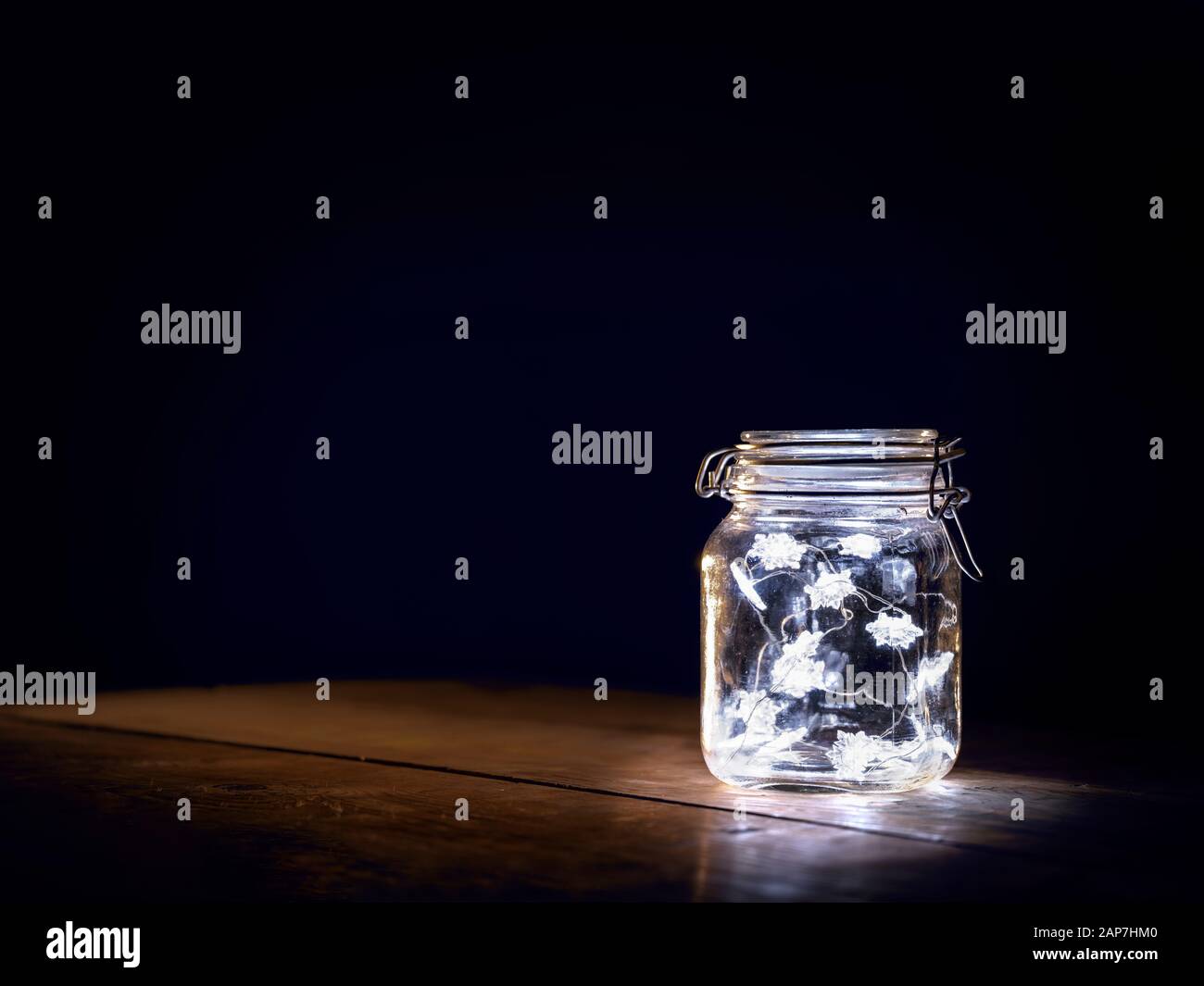 Lights inside Clear Jar Stock Photo