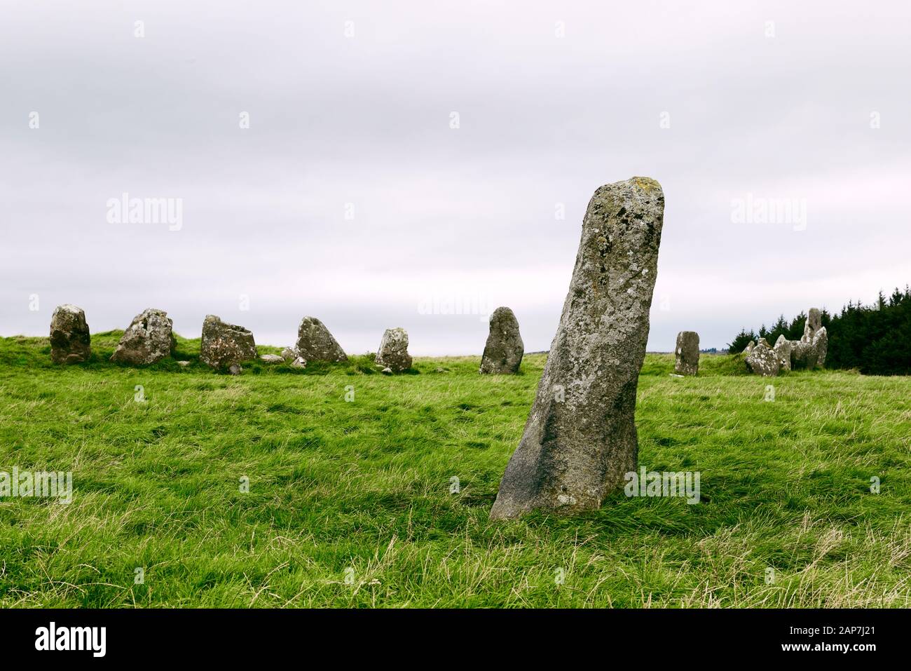 Beltany prehistoric stone circle. Raphoe, Donegal, Ireland. Neolithic and Bronze Age ritual site 2100-700 BC. Outlier with the S.E. quadrant behind Stock Photo