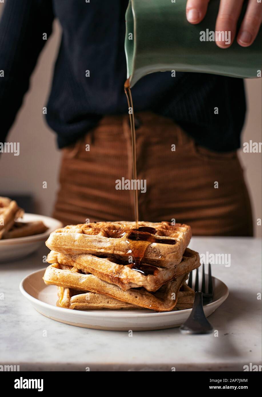 Syrup Pouring on Waffles Stock Photo Alamy