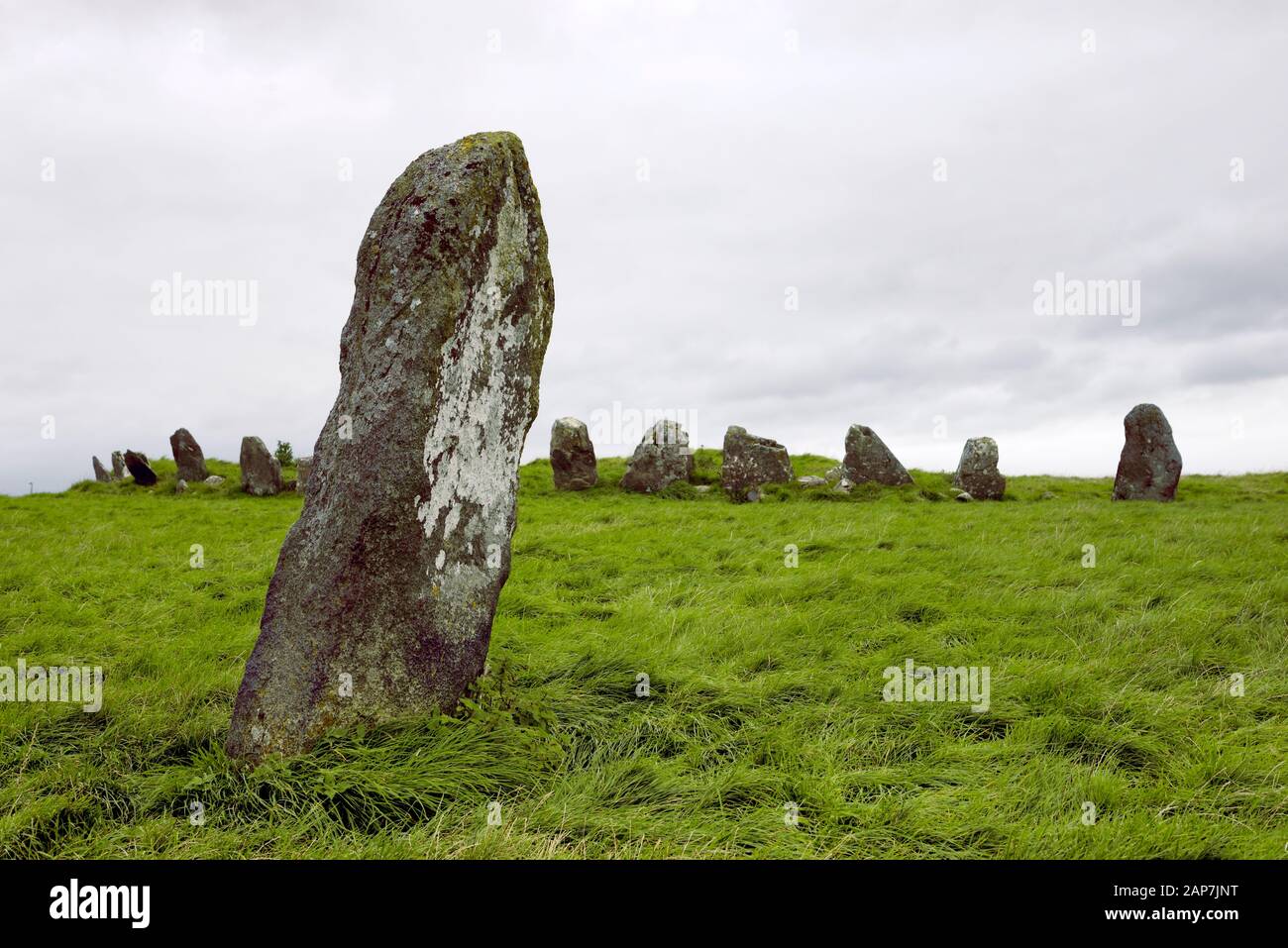 Beltany prehistoric stone circle. Raphoe, Donegal, Ireland. Neolithic and Bronze Age ritual site 2100-700 BC. Outlier with the S.E. quadrant behind Stock Photo