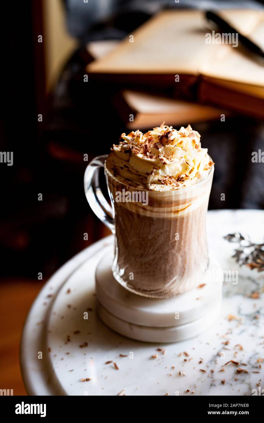 Thick Spanish Style Hot Chocolate with homemade whipped cream Stock Photo