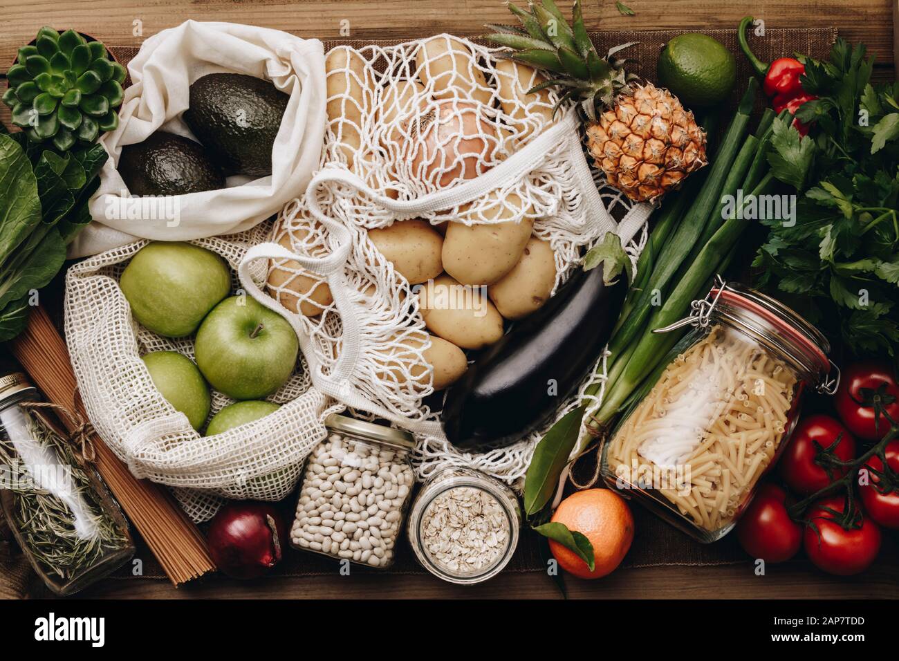 Zero waste food shopping. Fruit and vegetables in cotton bags, pasta