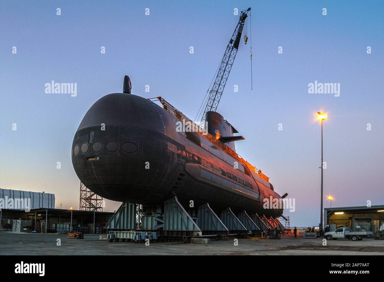 Australian Navy Collins Class diesel electric submarine undergoing service on dry land.. Stock Photo