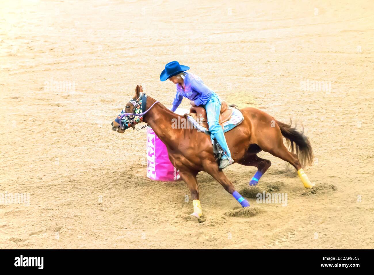 Ladies barrel race Stock Photo - Alamy