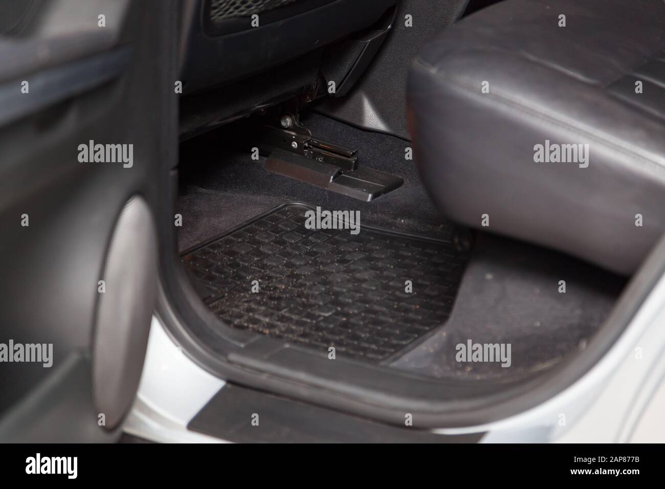 Clean Car Floor Mats Of Black Rubber Under Rear Passenger Seat In