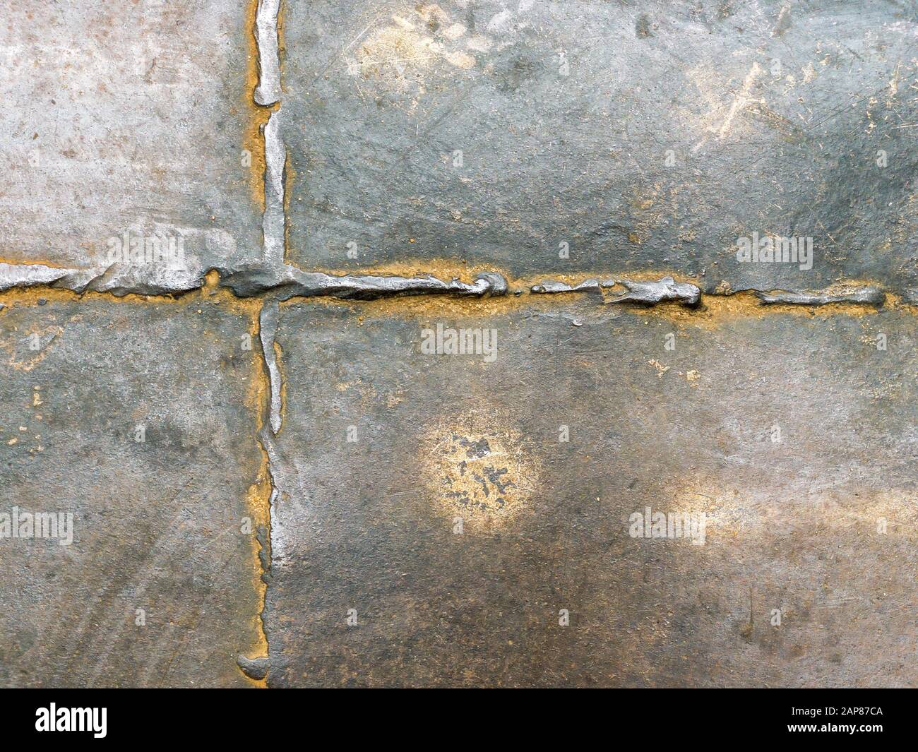 old rusted metal background texture with weld seams Stock Photo