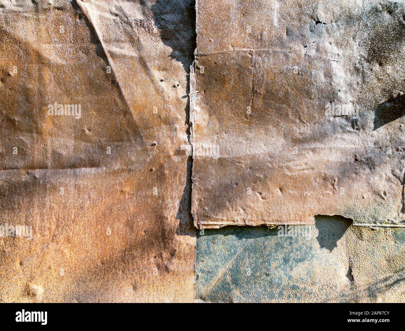 old crumpled rusted metal sheets. rusty metal texture background Stock Photo