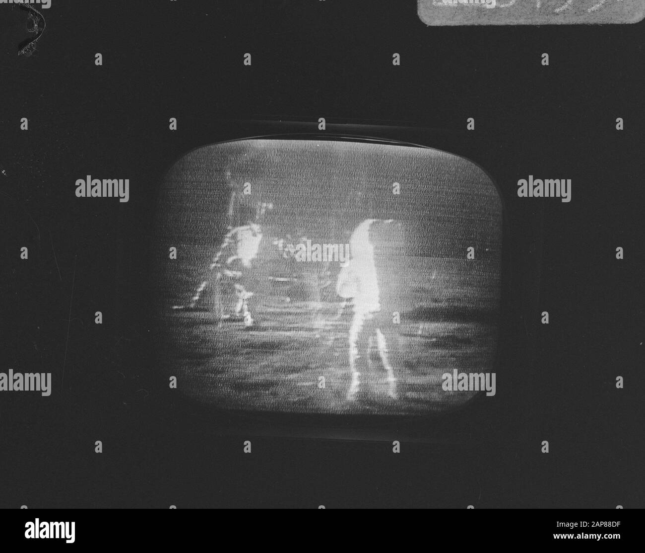 The American astronauts Neil Armstrong and Edwin Buzz Aldrin set foot on the moon; picture of the TV taken Description: Armstrong and Aldrin on the Moon Date: July 21, 1969 Keywords: moon landings, spacers, television Personal name: Aldrin, E.E., Armstrong, N.A. Stock Photo