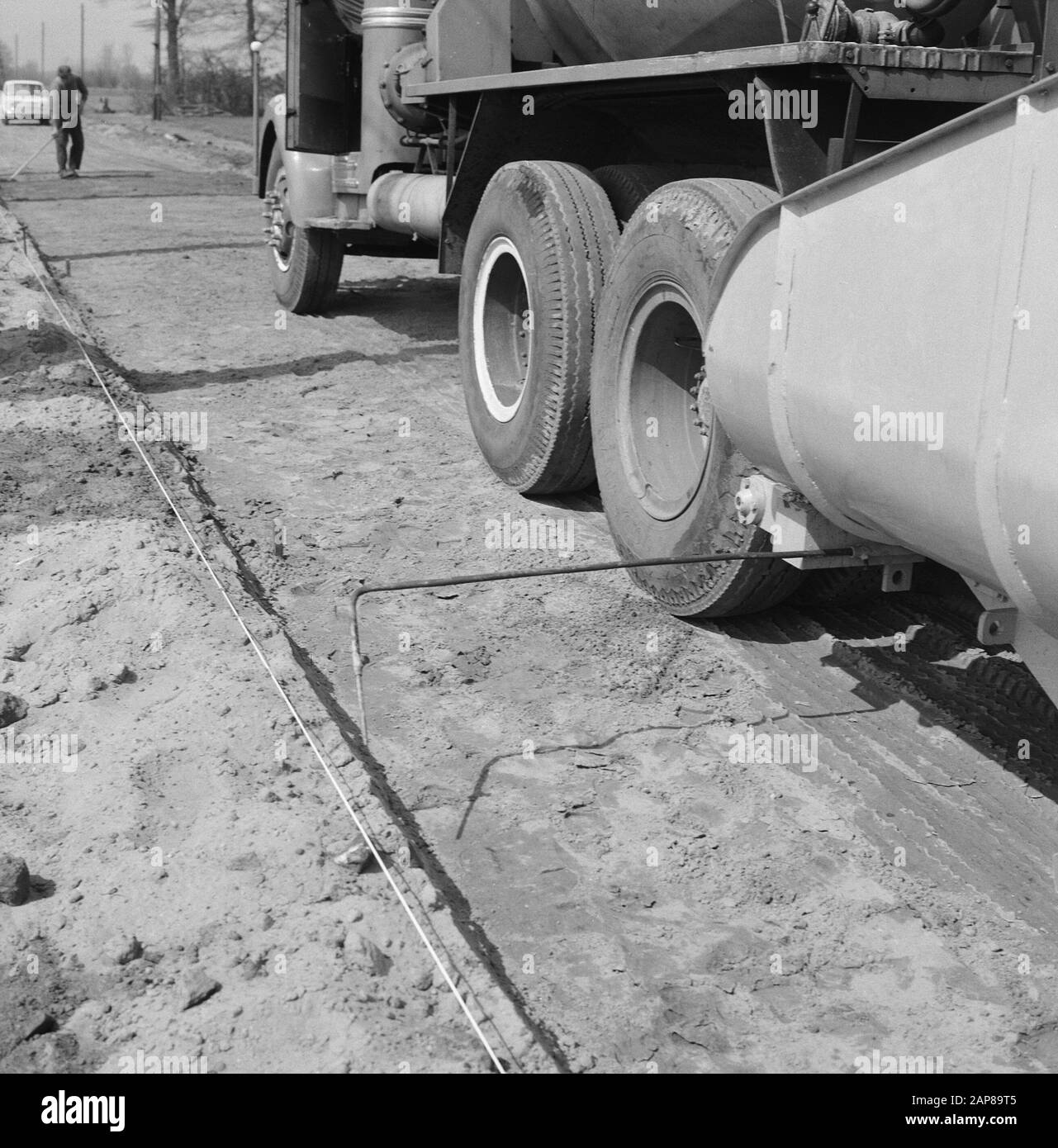 construction and improvement of roads, dikes and savings basins, construction concrete road, concrete road machines, controllers, wires, dorther and oxerweg Date: May 1964 Location: Gorssel Keywords: construction of concrete road, construction and improvement of roads, control systems, concrete road machines, dikes and savings basins, wires Person name: dorther en oxerweg Stock Photo