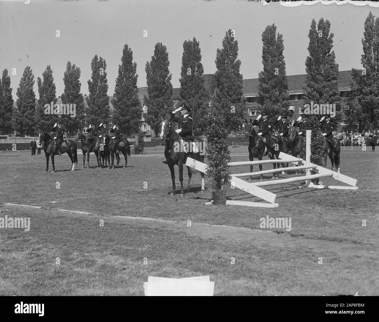 Amsterdam ridden police jubileum around barrel organ Date: June 17, 1950 Keywords: POLICE, barrel organs, jubilee, horses Stock Photo