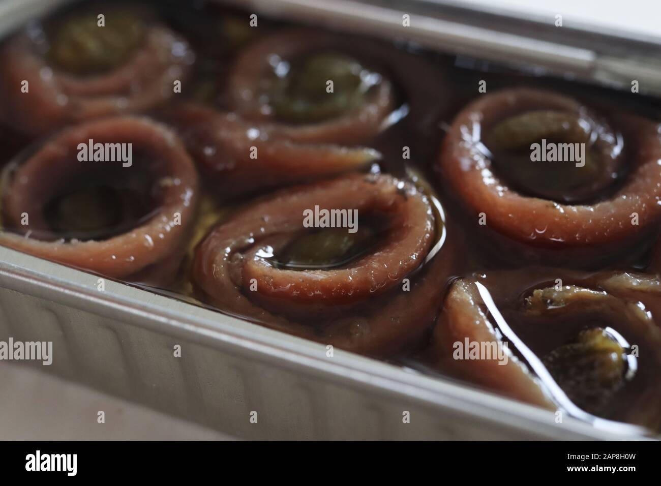 Tin of rolled up anchovies with capers Stock Photo Alamy