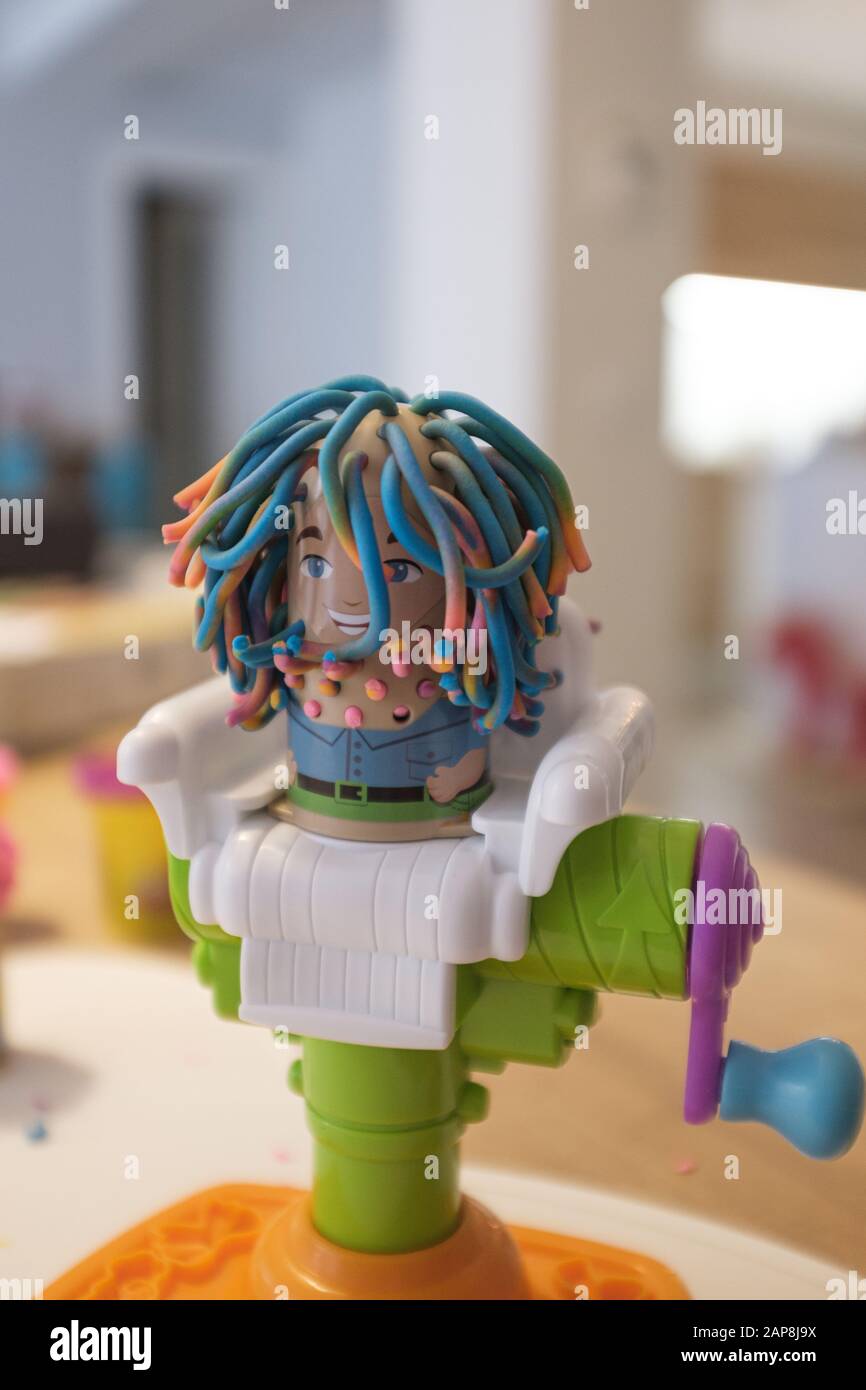 Hairdresser's plasticine toy close up still Stock Photo