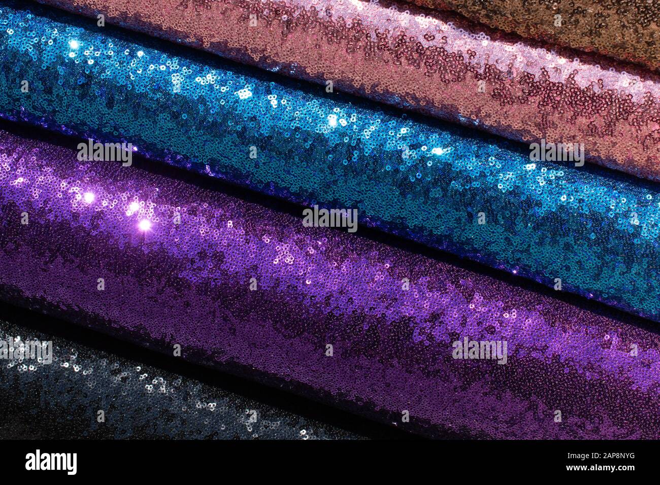 Examples of bright fabric of various color in view Stock Photo - Alamy