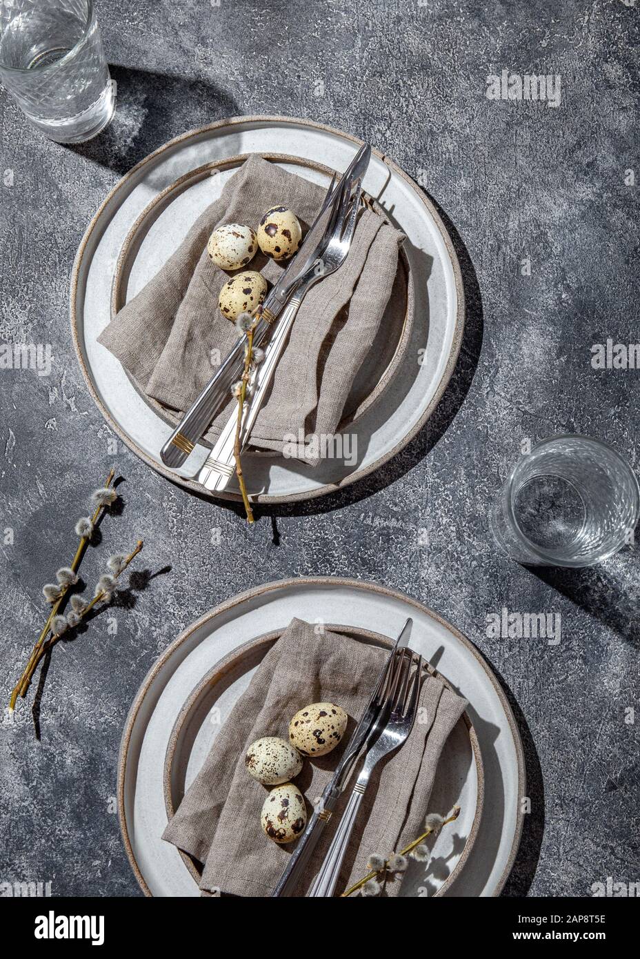 Easter festive table setting with quail eggs. top view Stock Photo