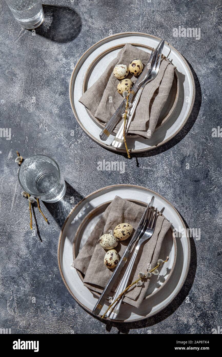 Easter festive table setting with quail eggs. top view Stock Photo