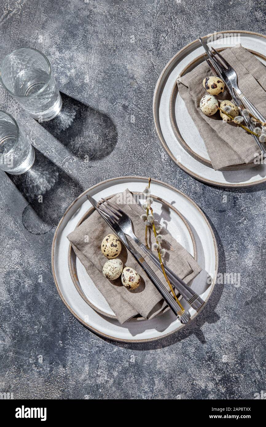 Easter festive table setting with quail eggs. top view Stock Photo