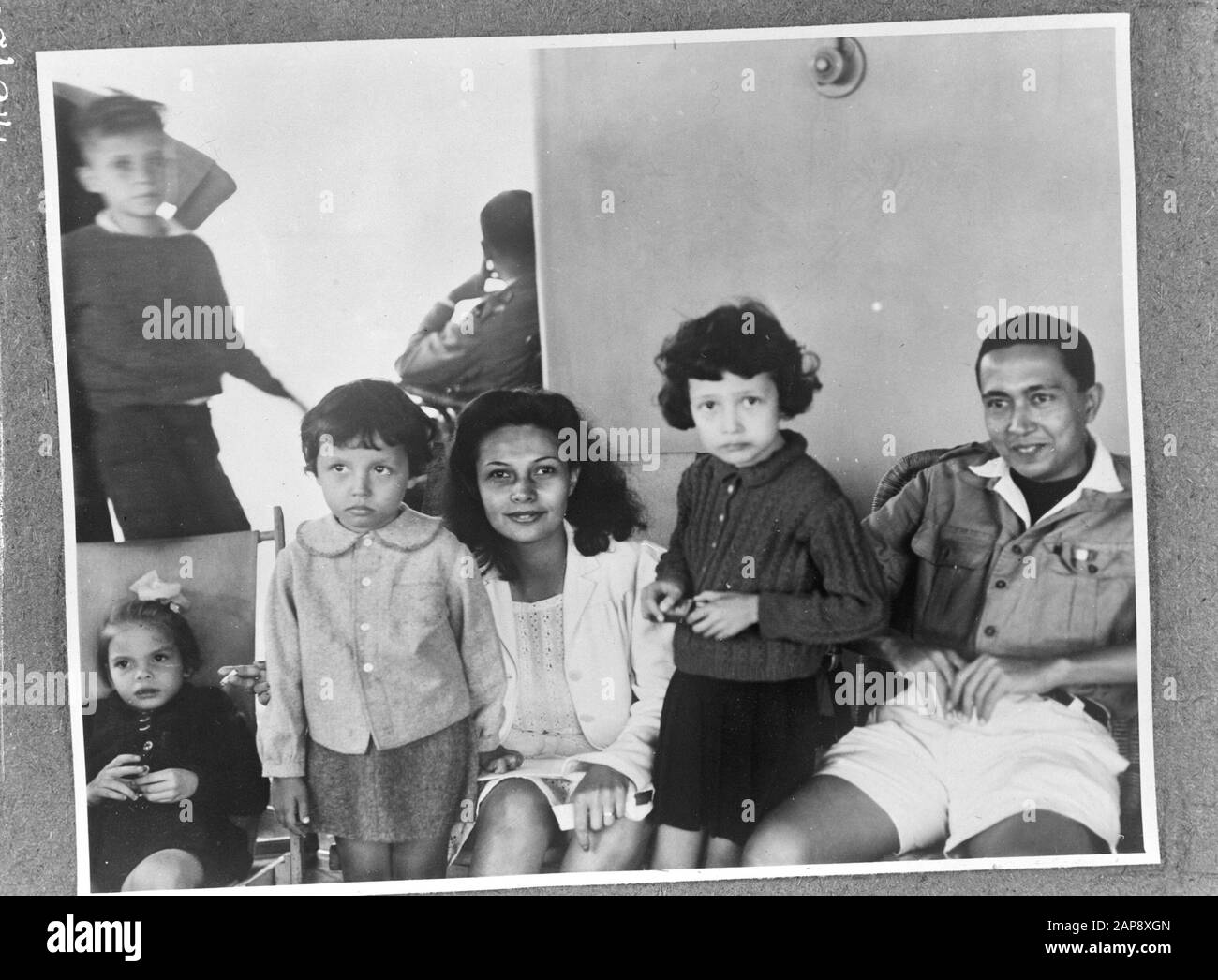 Dutch internees arrive in Melbourne with the Orange Fontein Description: The Orange Fontein with Dutch internees on board from Japanese prison camps in Batavia (Dutch East Indies) arrives in Melbourne on 27 October 1945. Mr. and Mrs. Goodsir with their children Carry (6 years) and Tianny (4 years) after landing at Victoria Docks. Mrs. Goodsir was a political prisoner of the Kempetai for one month. She was tortured by the Japanese (including pulling off nails and working with burning cigarettes). The family will recover three months Date: 27 October 1945 Location: Australia, Melbourne Keywords: Stock Photo