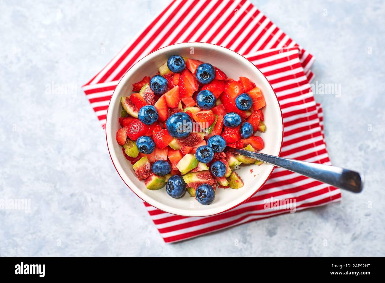 Fruit salad bowl banana raspberry hi-res stock photography and images ...