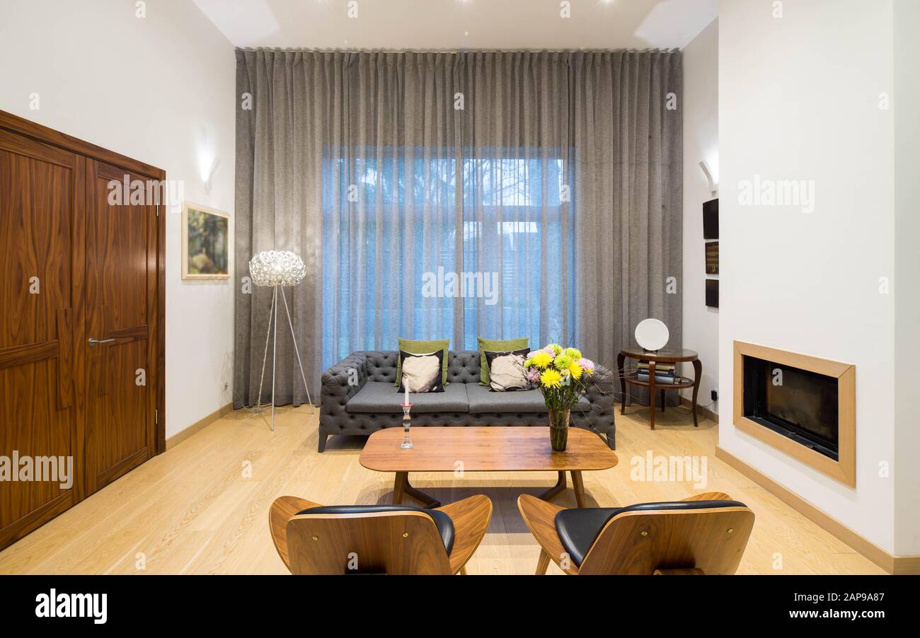 Living Room In Studio Apartment With Furniture Modern Interior Of The Flat Private House Fireplace In The Wall Stock Photo Alamy