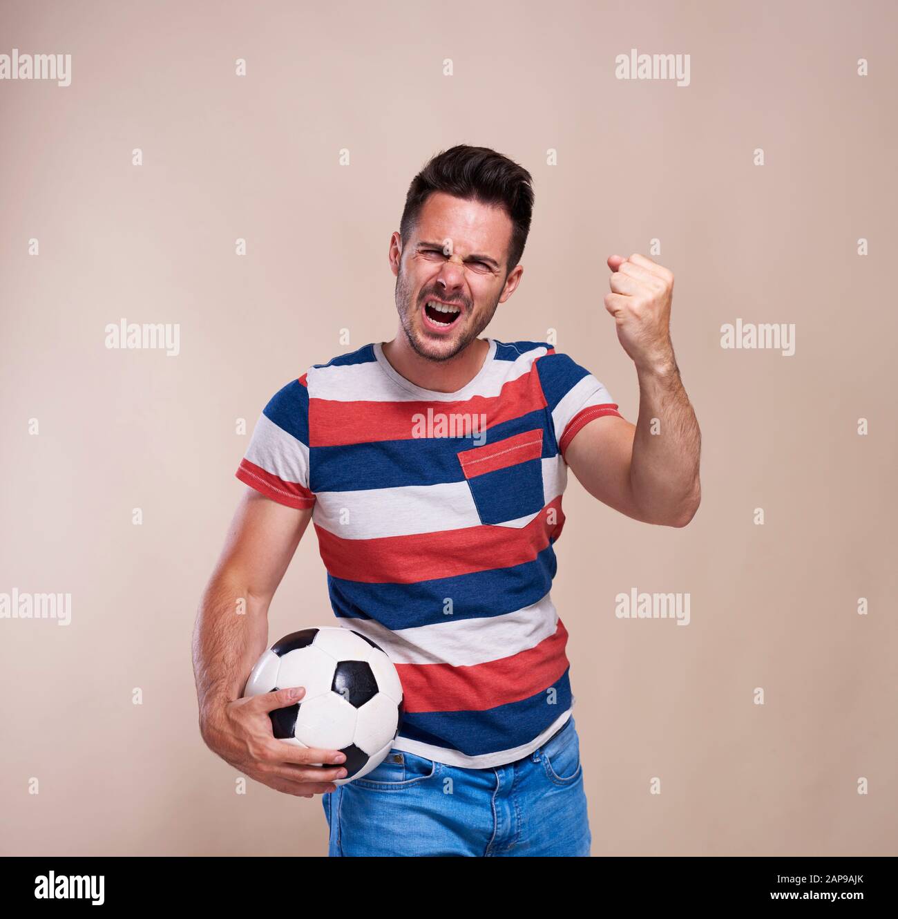 Fan is disappointed with soccer game Stock Photo Alamy