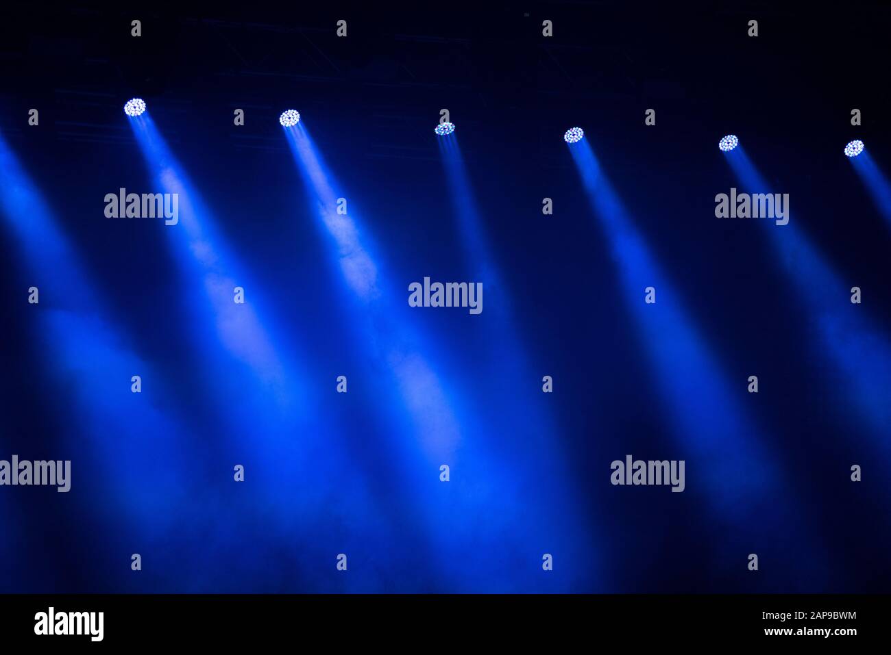 Blue stage lights in the dark at music festival Stock Photo Alamy