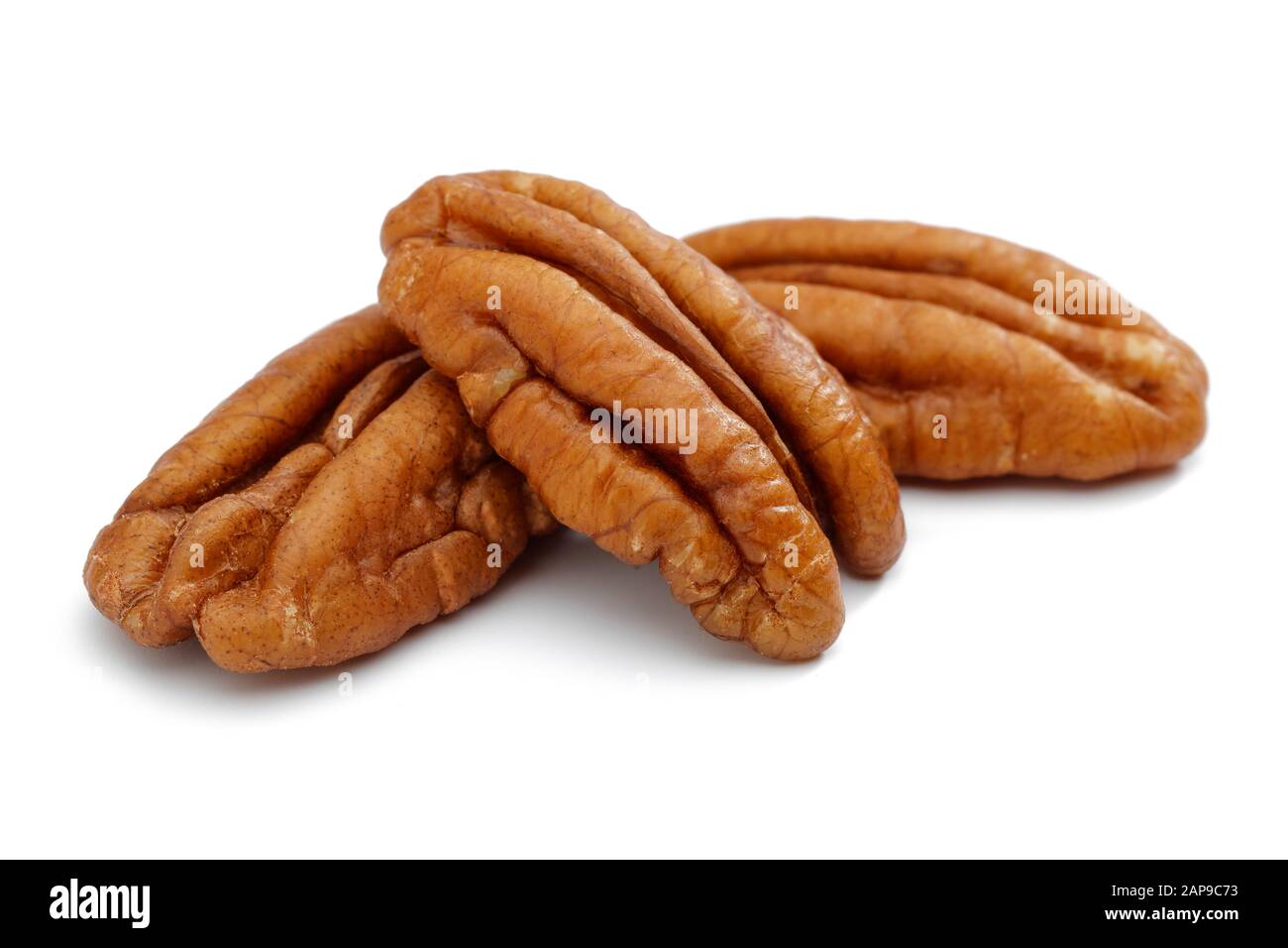 Peeled pecan nuts isolated on white background Stock Photo