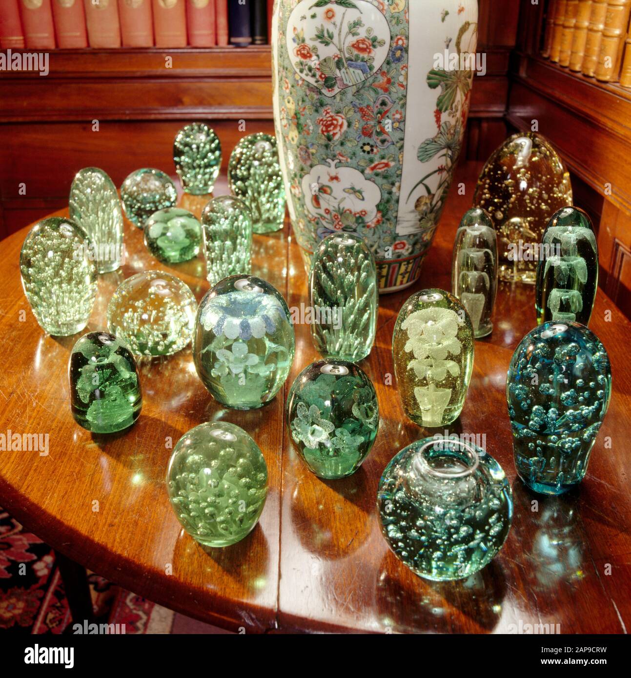 Collection of glass doorstops and paperweights. These were mainly made in Stourport, Worcestershire in the late nineteenth century. In The Library at Stock Photo