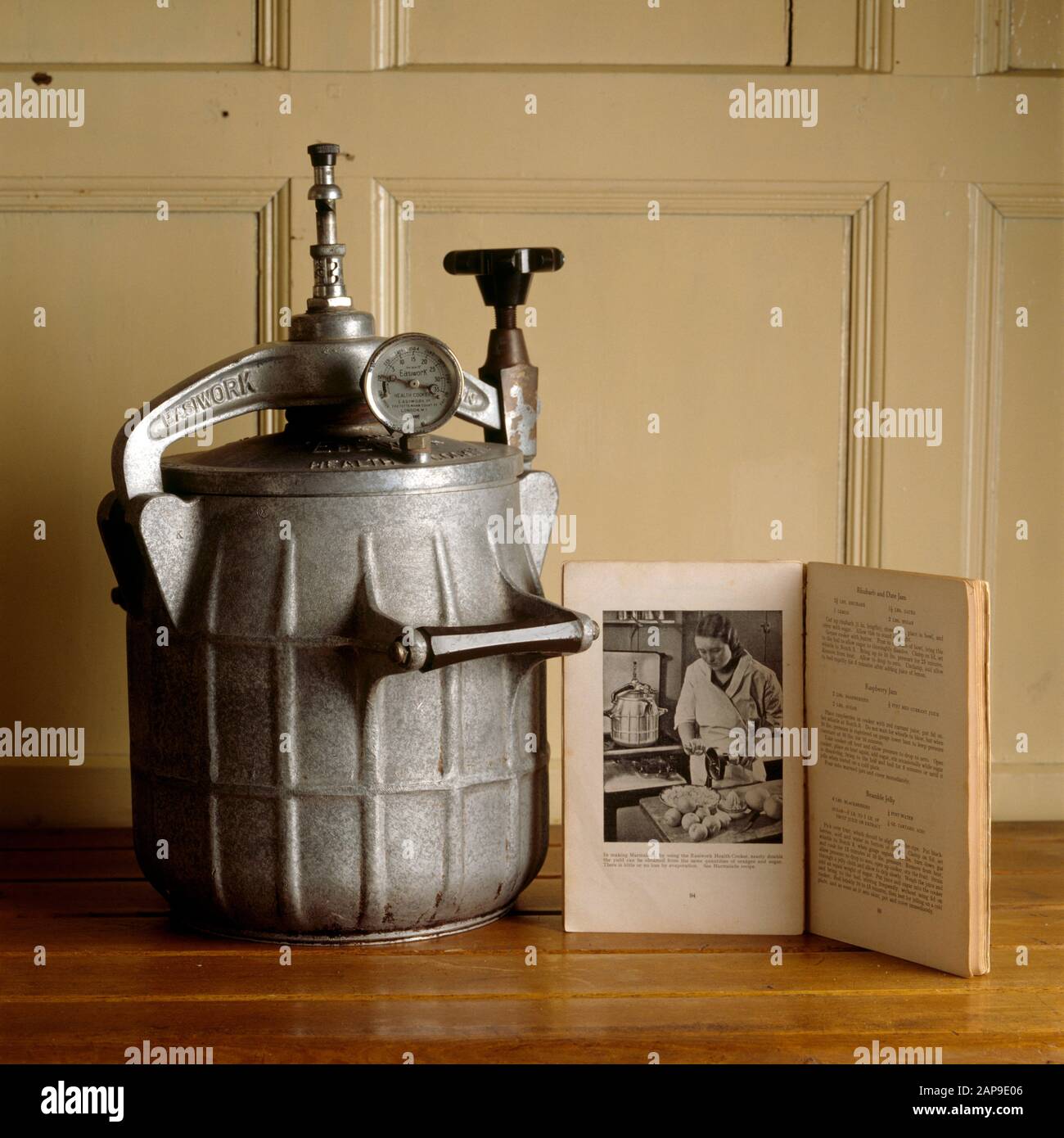 Close up of a pressure cooker with instruction book in the kitchen at Baddesley Clinton. Stock Photo