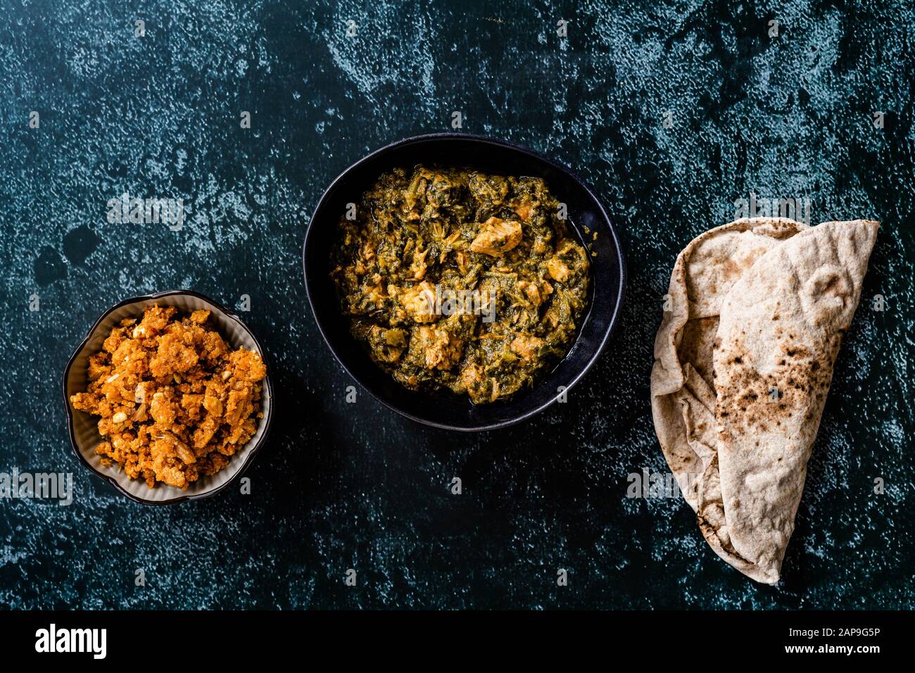 Indian Dish Spinach Lamb Palak with Gajar ka Halwa / Helva is a carrot