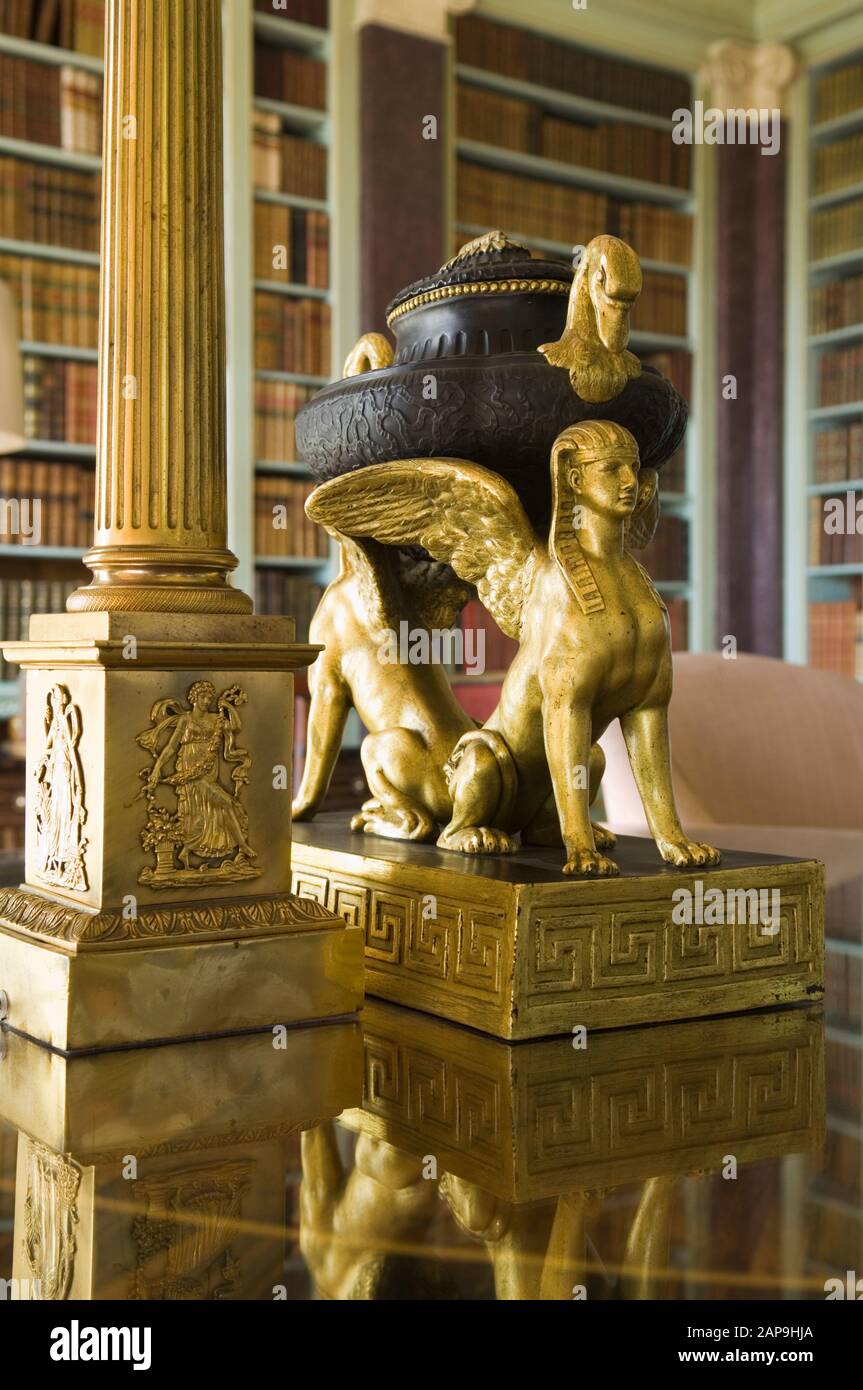 Egyptian porphyry and ormolu urn in the style of Louis XVI, in the Library at Hinton Ampner, Hampshire. Stock Photo