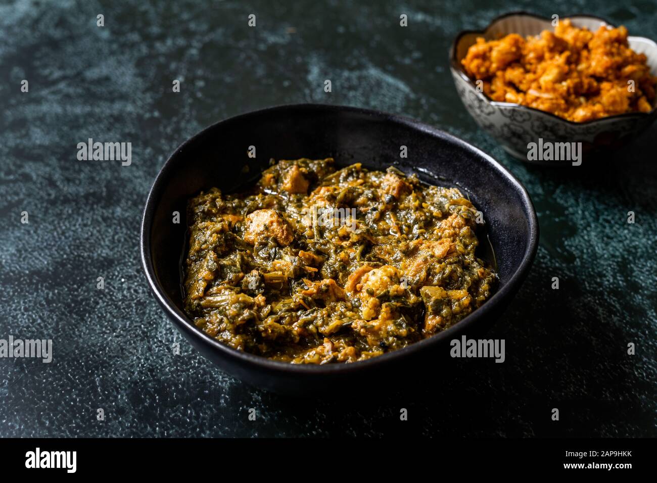 Indian Dish Spinach Lamb Palak with Gajar ka Halwa / Helva is a carrot
