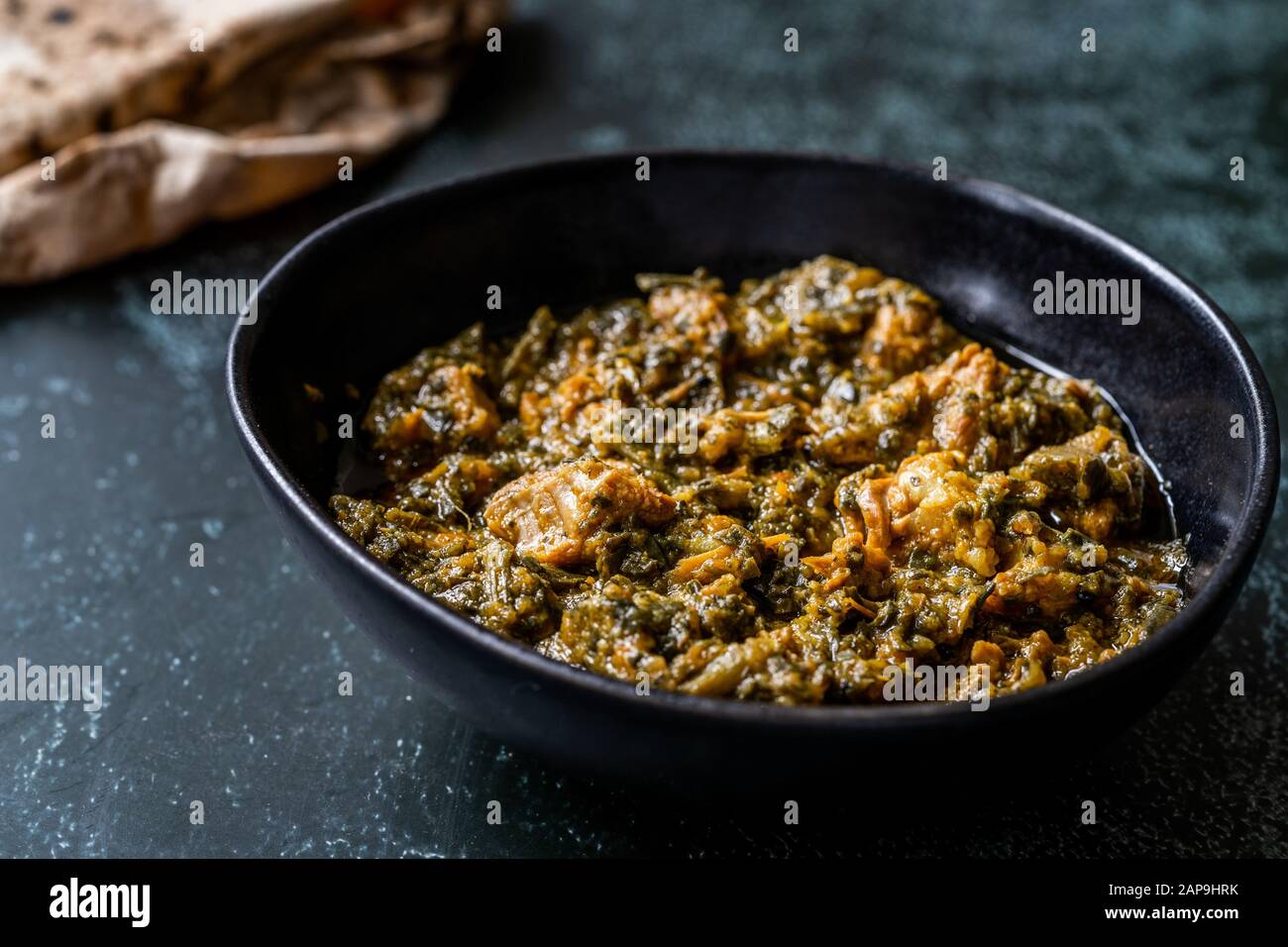 Indian Dish Spinach Lamb Palak with Chappati Flat Bread. Traditional