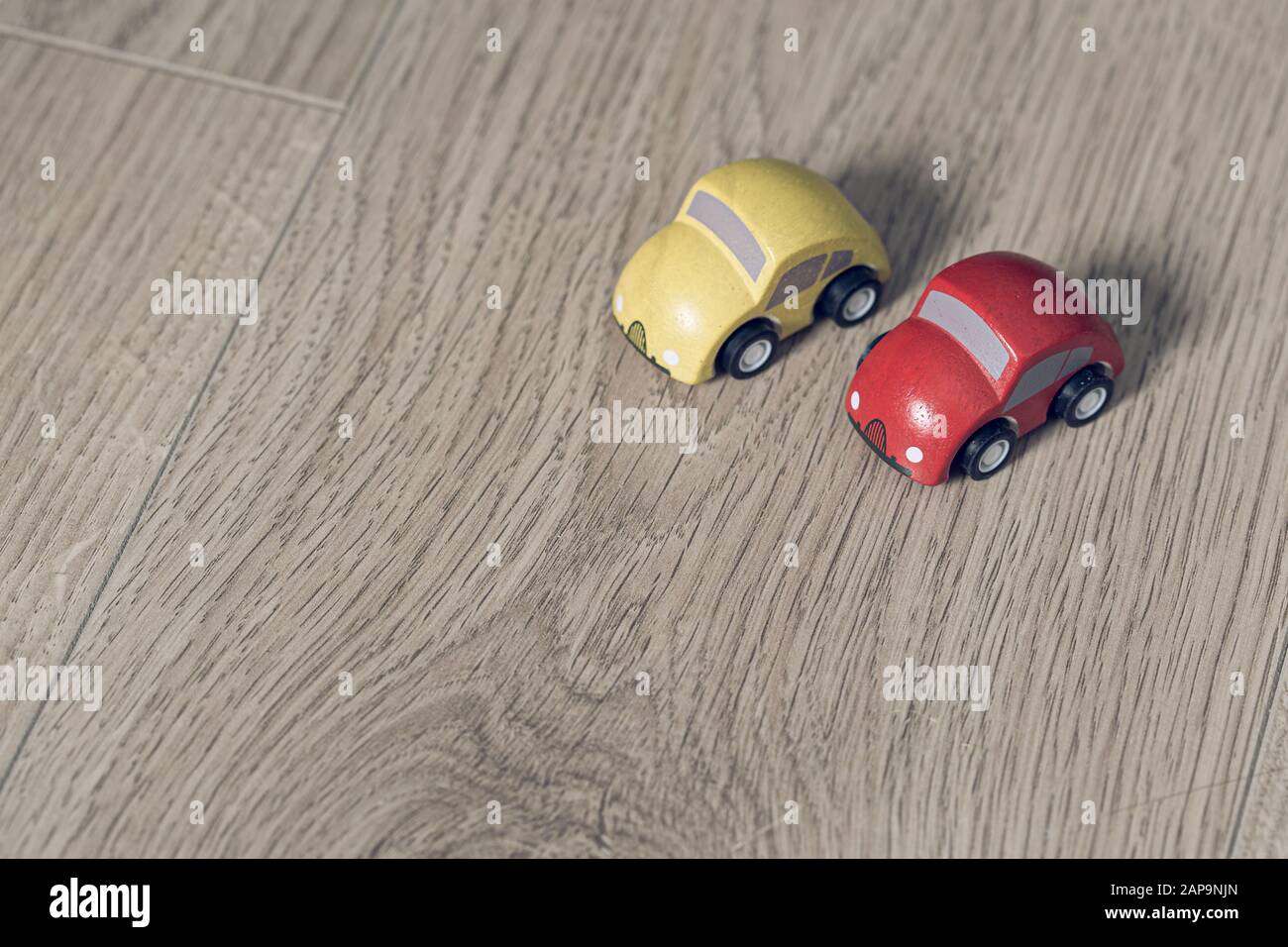 Red and yellow toy tiny car Stock Photo