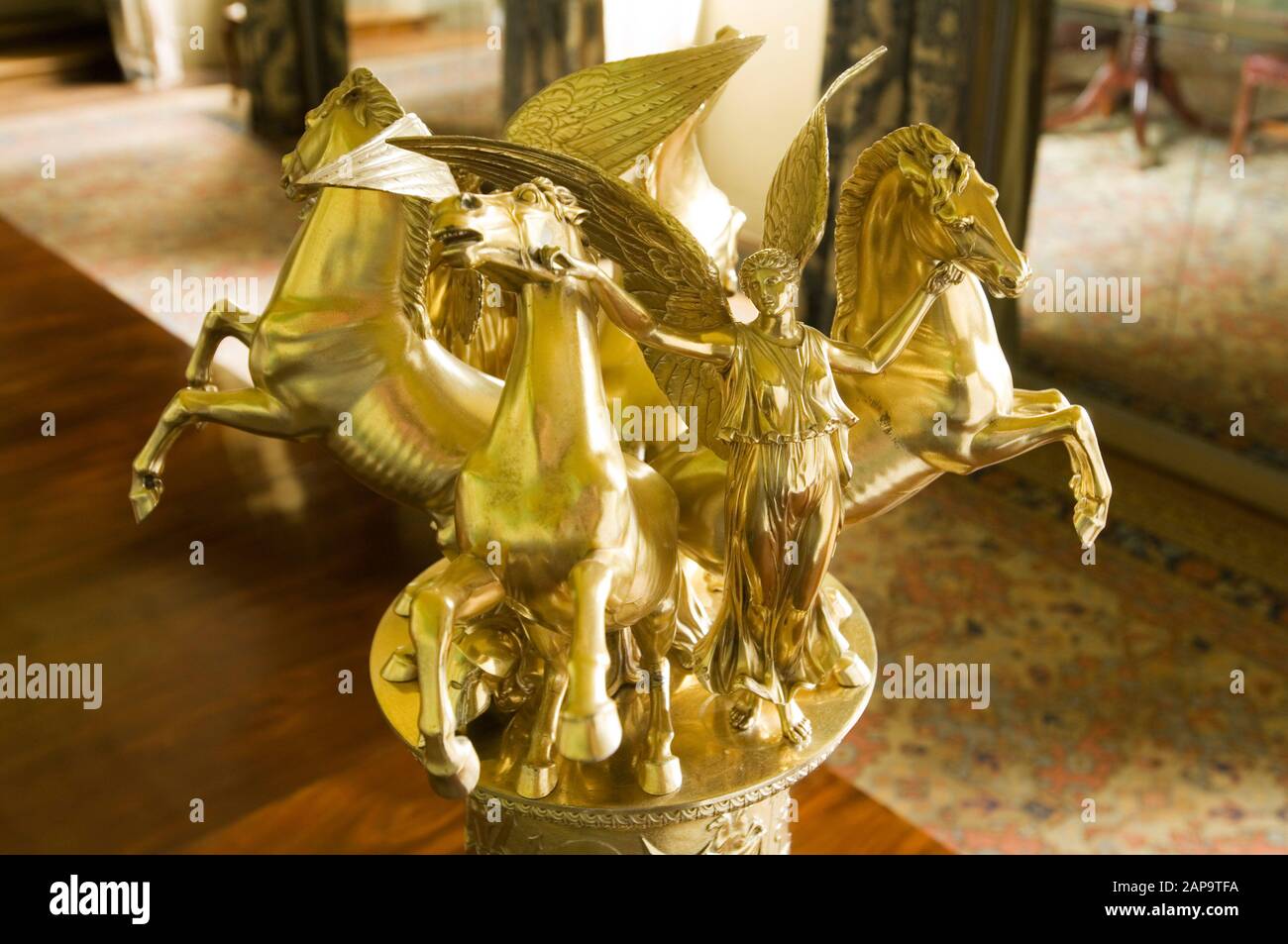 Close view of the top of the silver-gilt trophy on the dining table in The Rex Whistler Room at Plas Newydd, on the Isle of Anglesey, Wales. The troph Stock Photo
