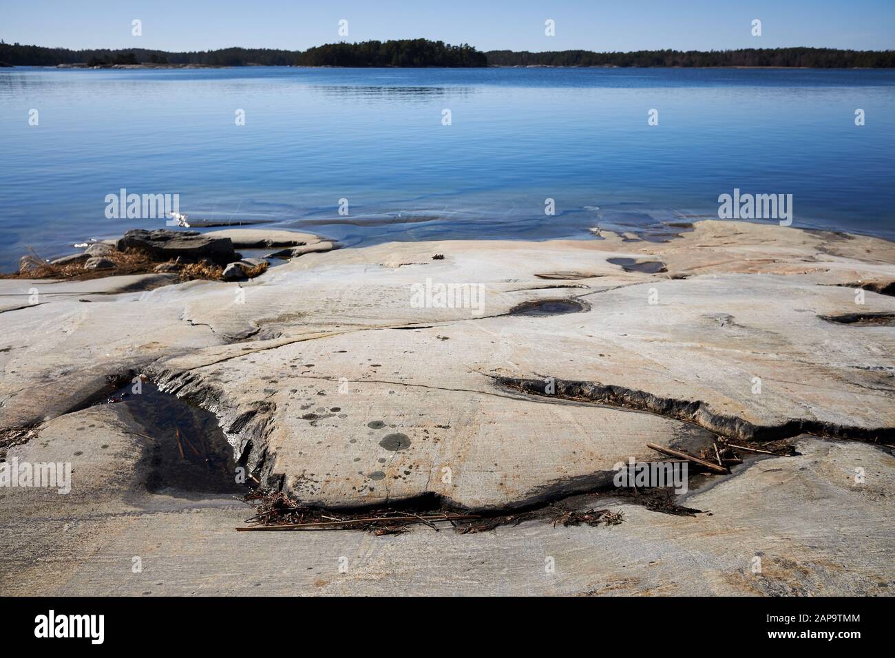 Peaceful summer landscape by the Baltic Sea in Kasnas, Kemio, Finland. Wide angle shot of the rocks on the seashore at Finnish archipelago. Stock Photo