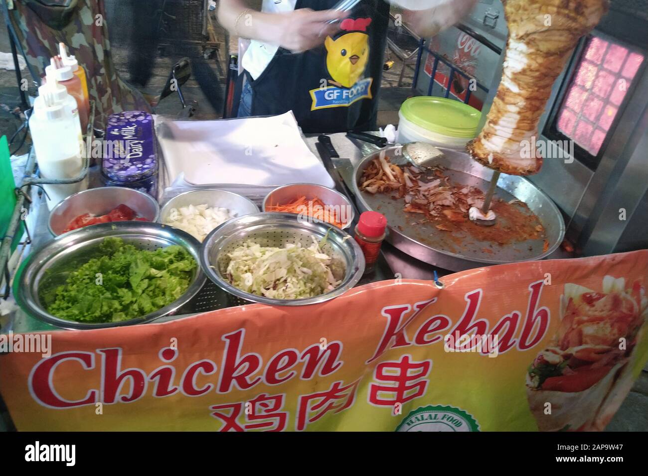 Bangkok, Thailand - December 26, 2019: Chicken kebab stall on Khao San Road. Stock Photo