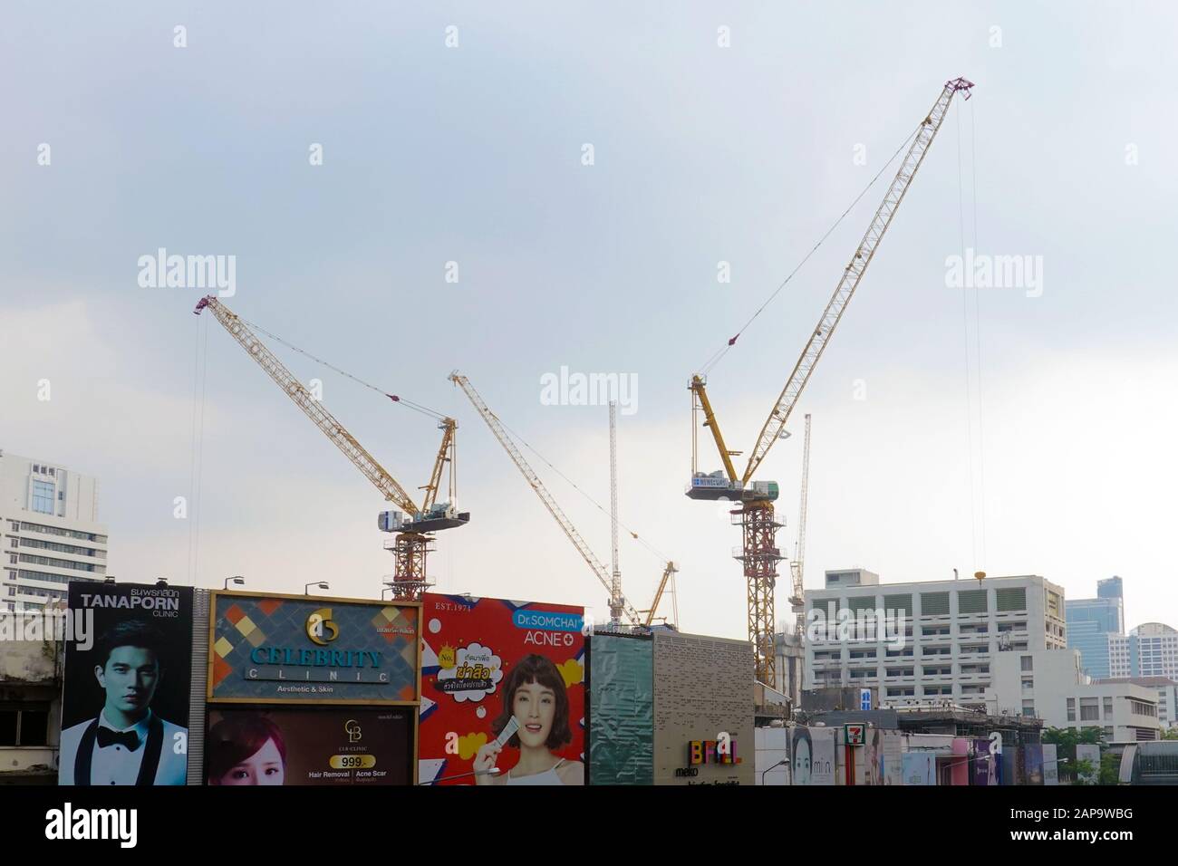 Bangkok, Thailand - December 25, 2019: Construction cranes in city centre. Stock Photo