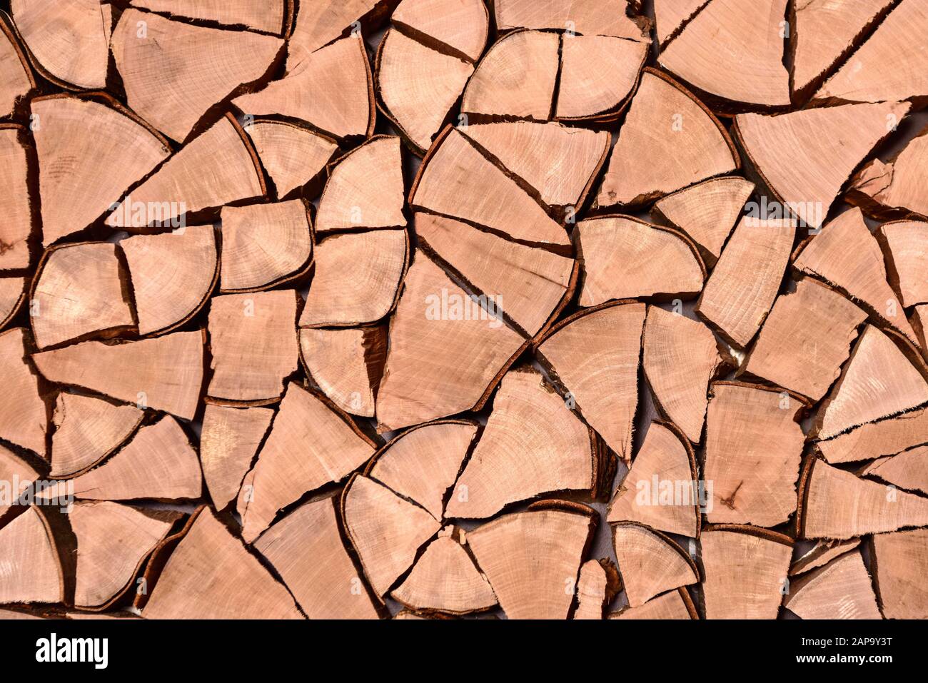 Split firewood as wall cladding, Switzerland Stock Photo - Alamy