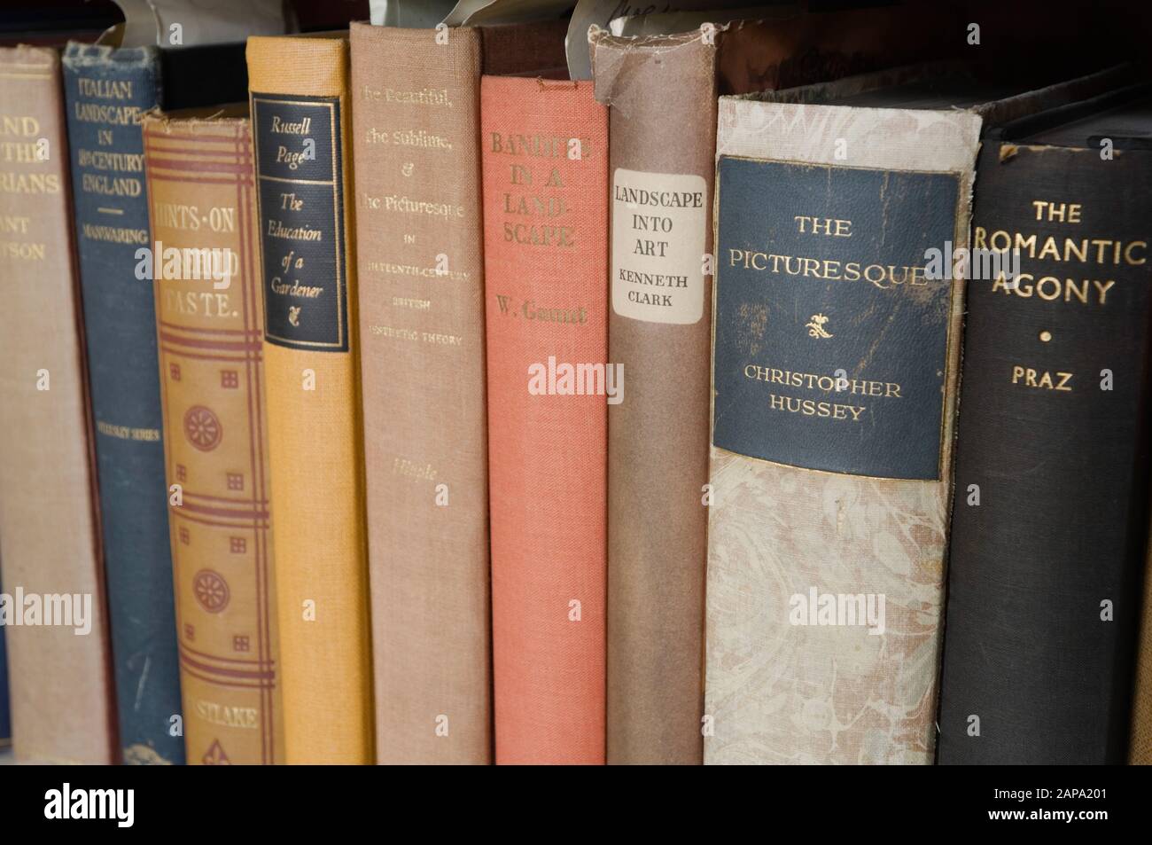 Spines of books in the white-painted bookshelves in the Study in the new house at Scotney. *** Local Caption *** Scotney Castle Stock Photo