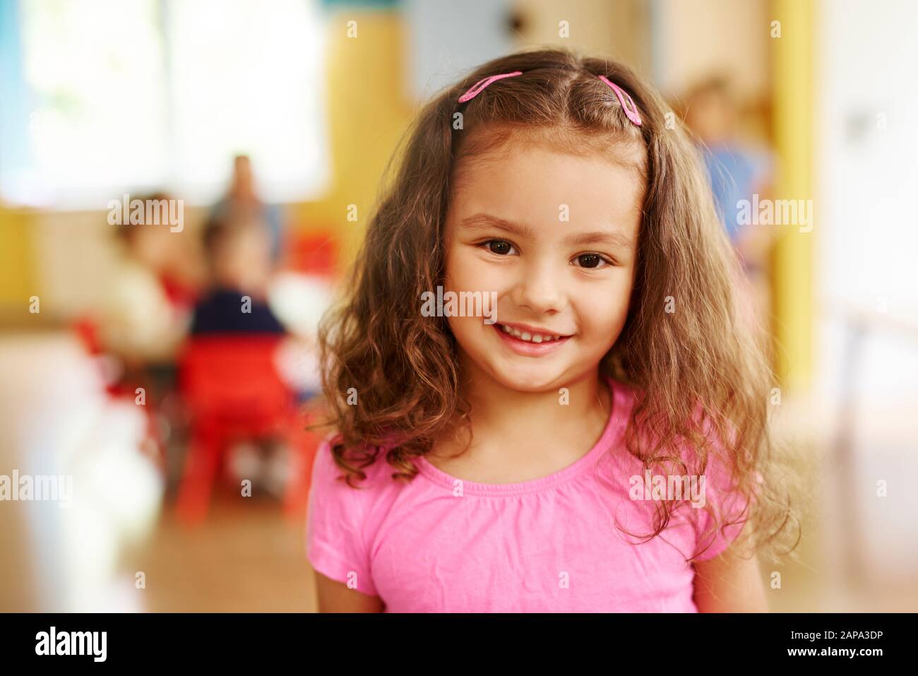 Portrait of smiling preschool girl Stock Photo