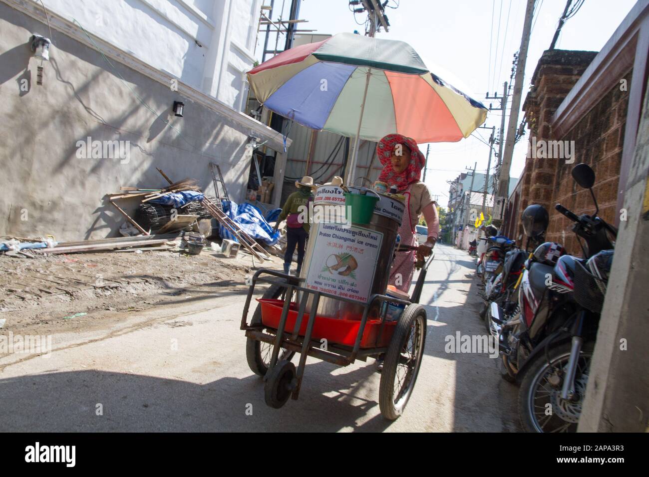 Chiang Mai Street food woman pull food cart,Thailand Stock Photo - Alamy