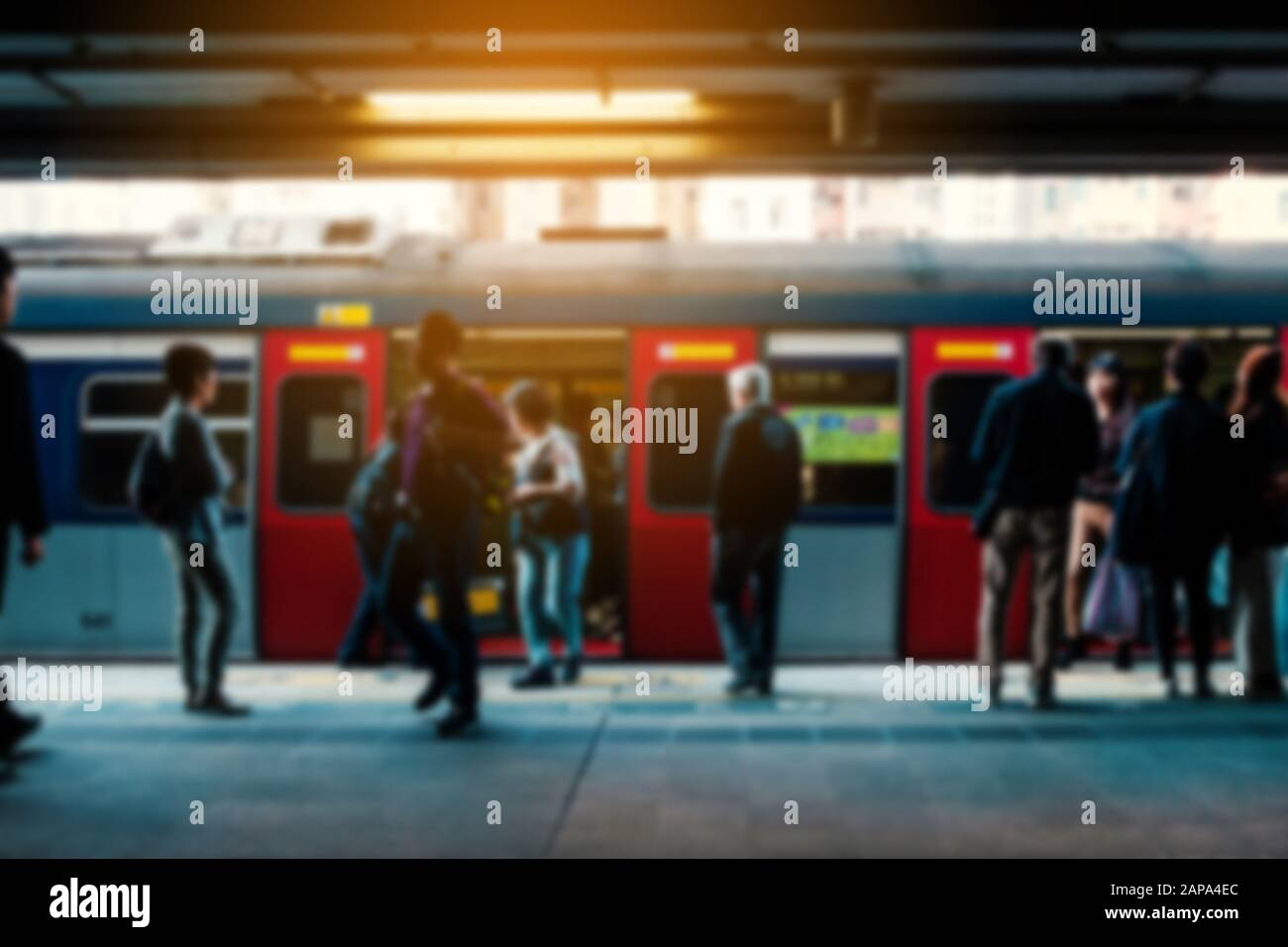 Blurry concept image of people travel by train on railway platform at  MTR train station in HongKong Stock Photo