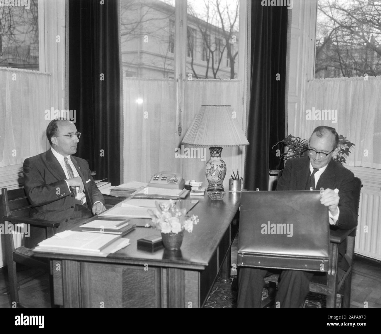 The cabinet crisis, formateur mr. Cals in conversation with minister of finance professor dr. Witteveen Date: March 17, 1965 Location: The Hague, Zuid-Holland Keywords: formateurs, conversations, cabinet formations, ministers Stock Photo