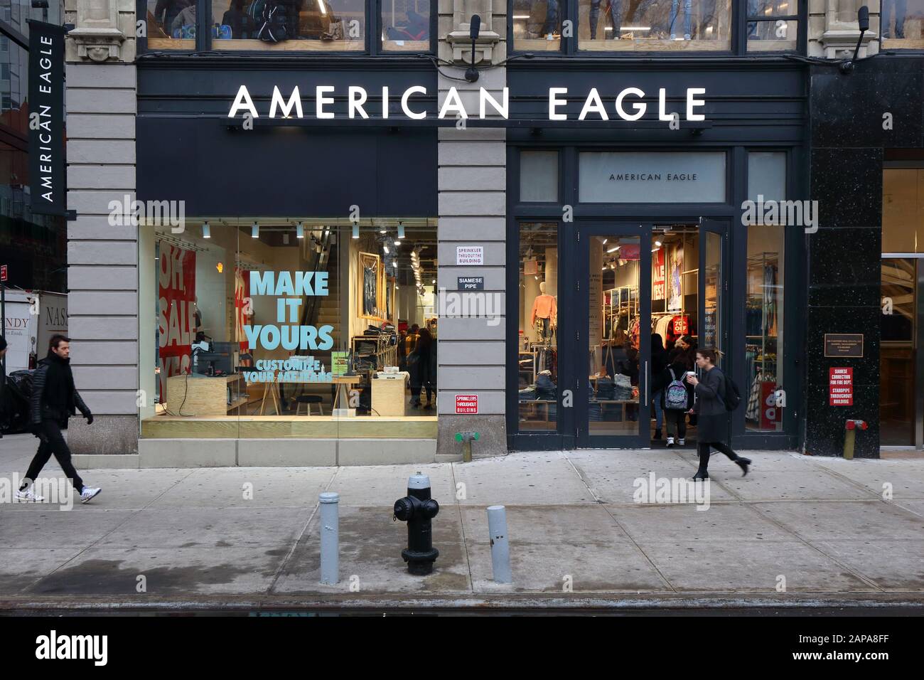 [historical storefront] American Eagle Studio, 19 Union Square West, New York, NY.  exterior storefront of a clothing store and custom jeans studio Stock Photo