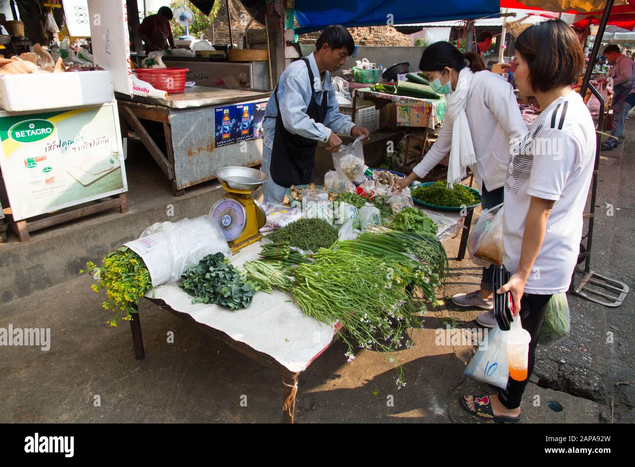 Chiang Mai Market scene, people shopping vegetable in stall Thailand Stock Photo