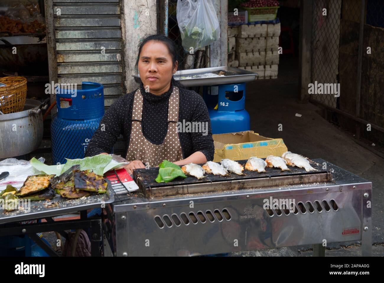 Chiang Mai woman seller in Market stall Thailand Stock Photo - Alamy